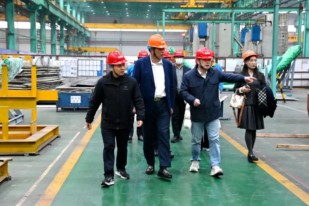 浙江联鑫板材科技董事长施清荣一行来访大明