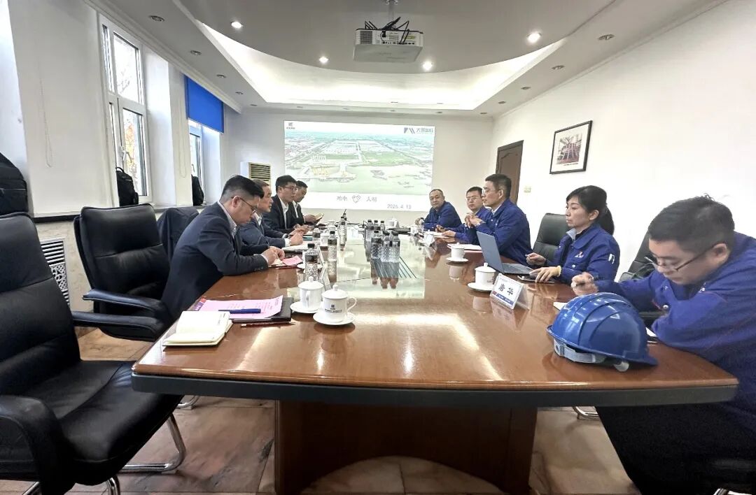 大明国际拜访哈电电机